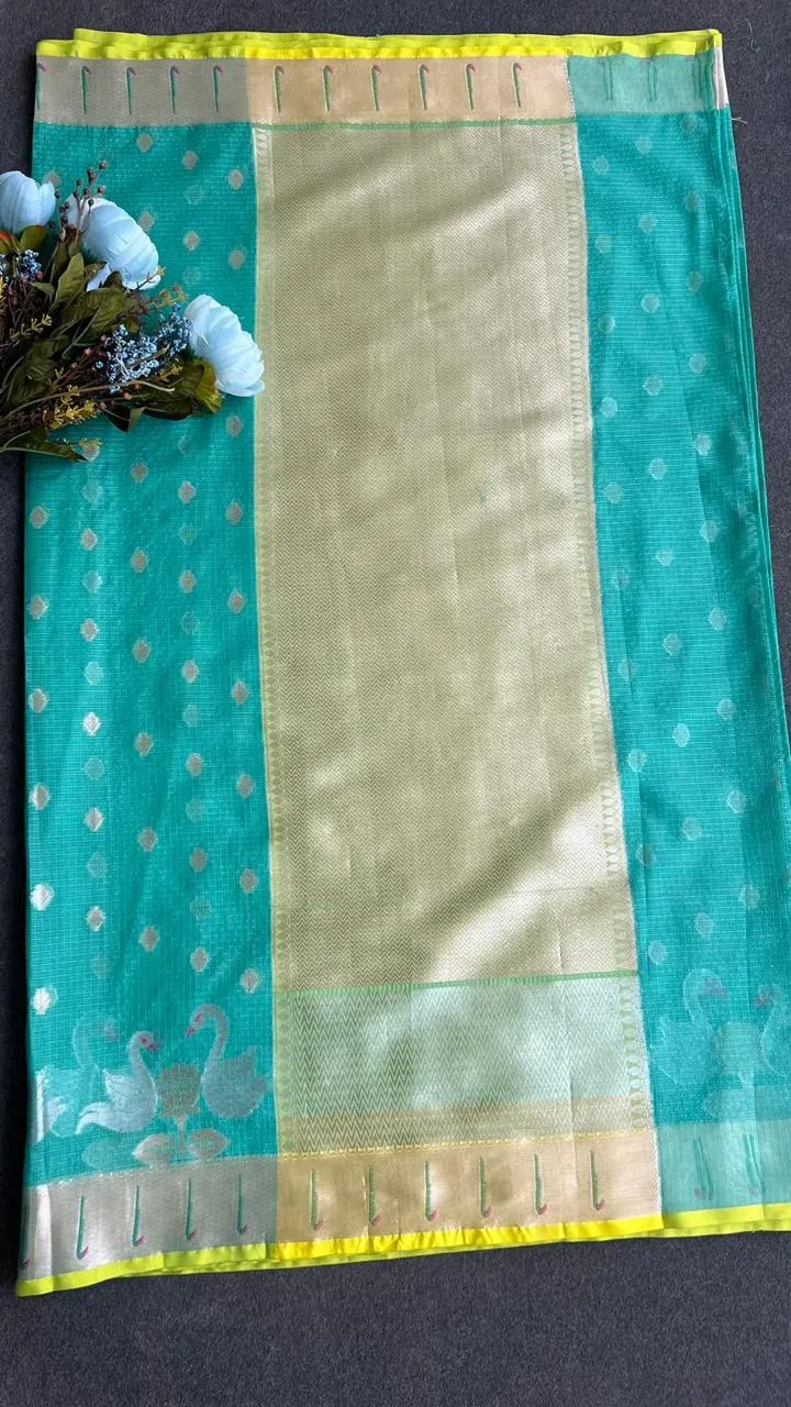 Sea green kota embroidery saree with parrot blouse