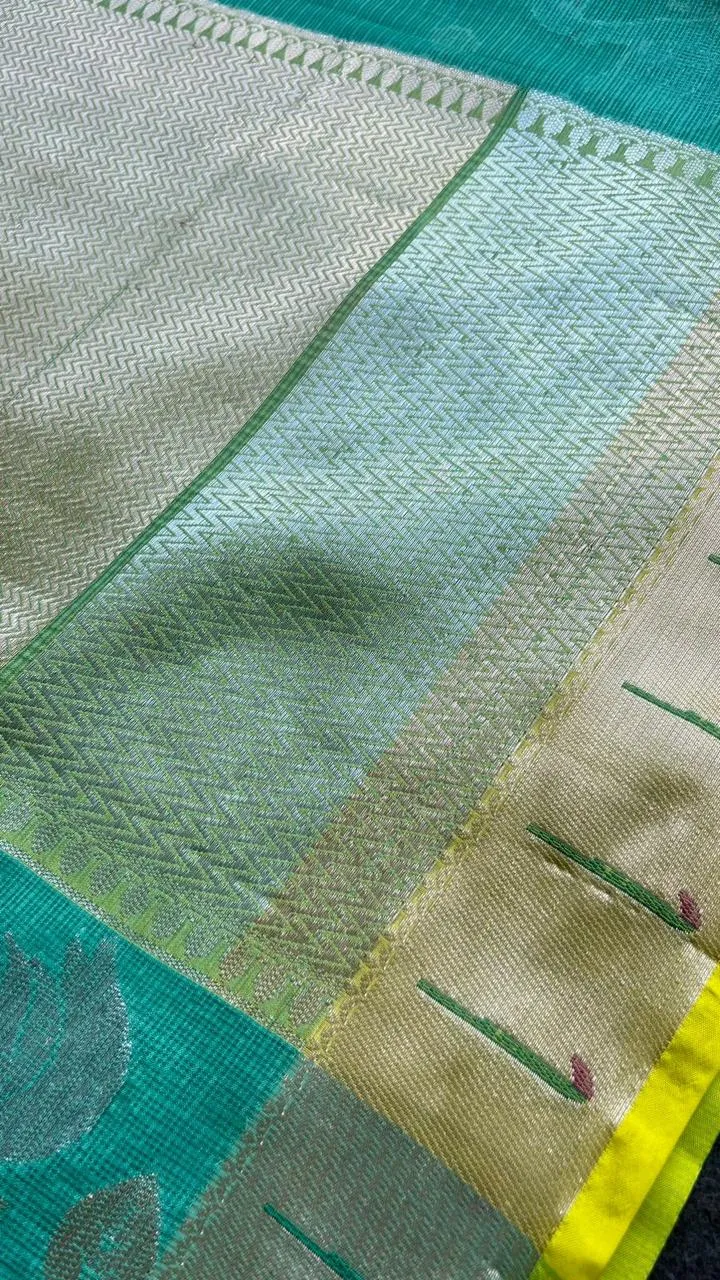 Sea green kota embroidery saree with parrot blouse